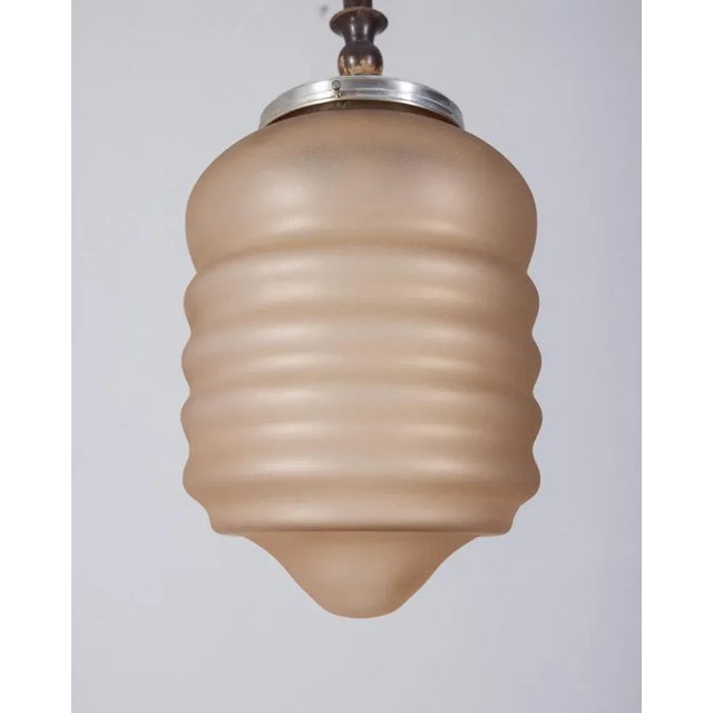 Pendant lamp with chromed metal and wood structure, pink glass lampshade, Italian design, 1950s. Up to 250V (Europe/UK...