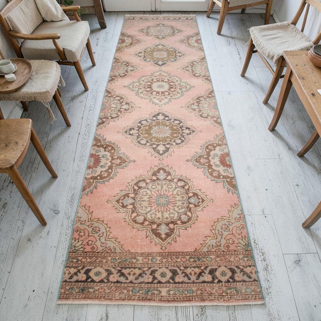 Woven in the 1970s at a women's cooperative workshop in the Sille district of Konya, this vintage Central Anatolian runner...