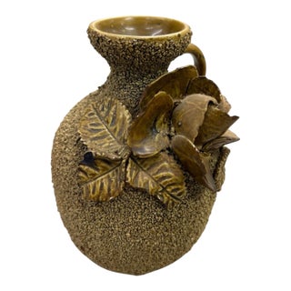 Vintage Earth-Tone Ceramic Pitcher Vase With Sculpted 3d Floral Motif & Pebble Texture For Sale