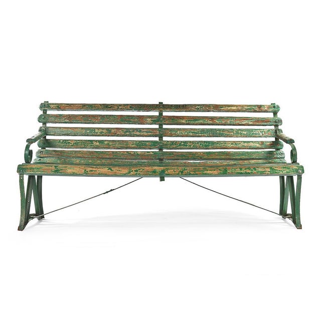Wooden Bench in the green patina This piece is designed in the style of the selected designer and/or manufacturer