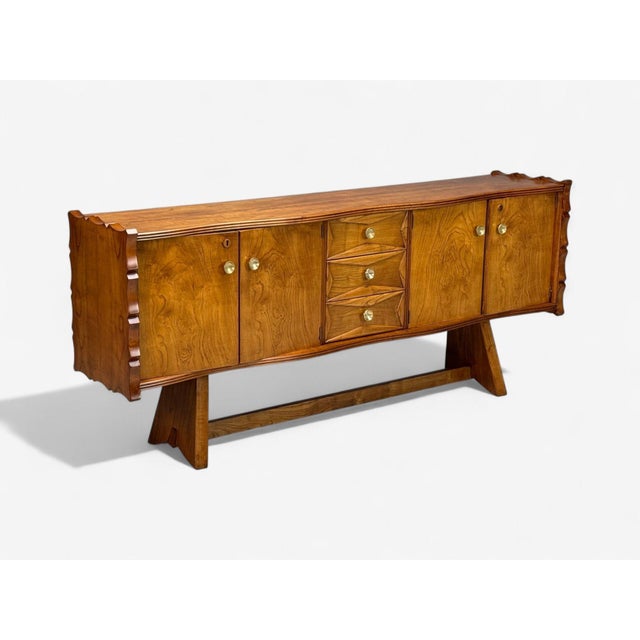 Paolo Buffa, Italian Mid-Century Modern, Cherrywood, Brass, Sideboard, Italy, 1950s A highly sculptural and unique...