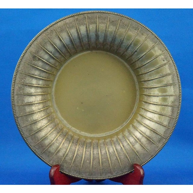 Item : a wonderful silver-plated brass candy holder, decorated on the brim with evenly spaced raised lines and raised...