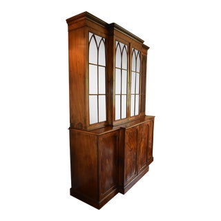 English Flame Grain Mahogany Breakfront Bookcase, Circa Early 1800s. An Overhang Cornice Is Above Four Glazed Doors With Gothic Arched Dividers. For Sale