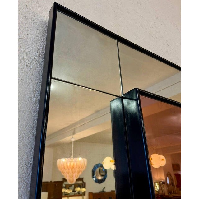 A refined and highly decorative Italian wall mirror dating from the late 1940s, attributed to Brusotti. The architectural...