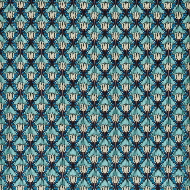 Be honest did you spot the birds at first glance hidden among the foliage? The Tulip & Bird pattern whose form bears all...