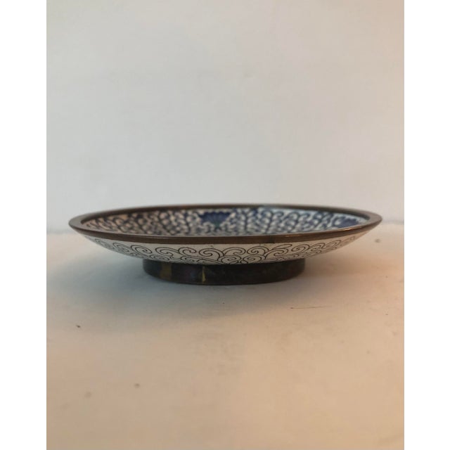 This Hand-Painted Enamel Footed Brass Trinket Bowl / Dish is the perfect little catchall dish for a guest room, dressing...
