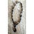 This vintage necklace is a bold, earthy strand of large, polished agate beads in a quiet palette of smoky gray, taupe,...