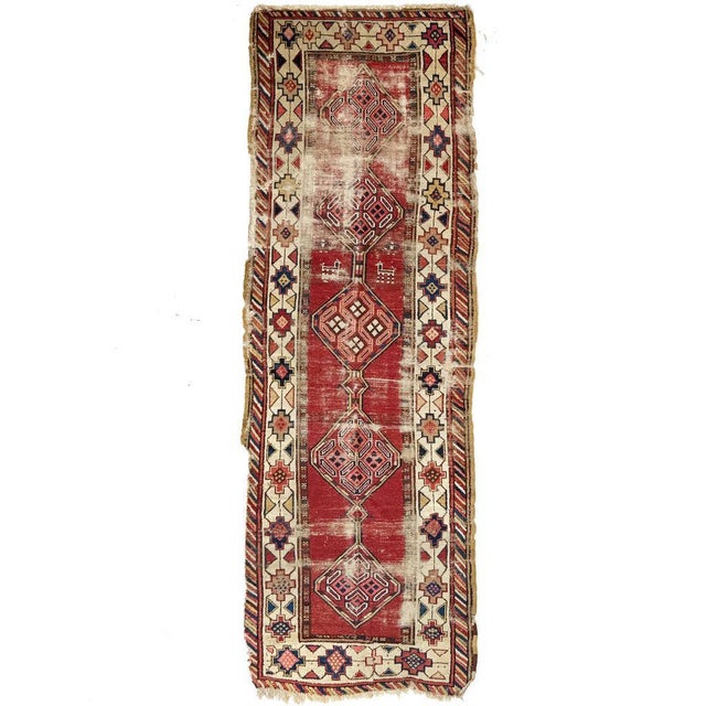 Name: WORN Caucasian Runner Perfectly Distressed | Rust, Animals, Blues, Beige Size: 3.3. x 10.2 Age: Antique, C....