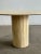 W51.5 D51.5 H28.5 Fully restored travertine dining table in excellent condition. Unit features a pedestal base, a smooth...
