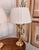 Beautiful pair of very heavy brass lamps with a classic three-arm, bouillotte style. Bases are in exceptional condition...