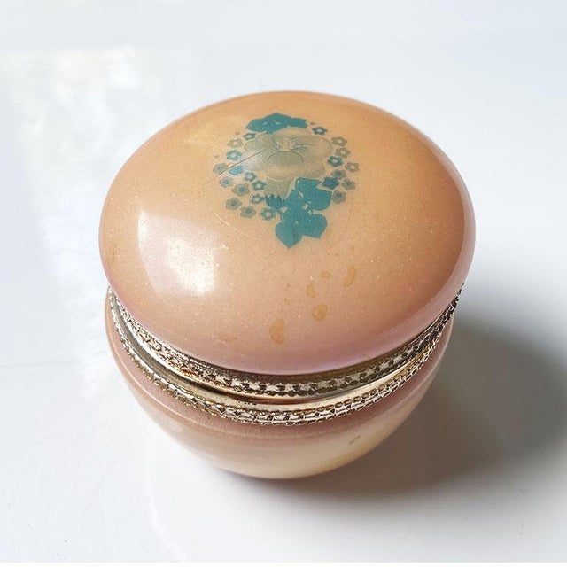 A lovely hand-carved round Italian alabaster or opaline glass trinket box in pink. This piece will be fabulous to display...