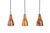Set of three perforated copper pendant lamps designed by Bent Karlby, from the 1950s, manufactured for Lyfa. Elegantly...