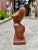 This is a handcrafted wooden sculpture of a feminine torso, beautifully showcasing the curves and grace of the human form....