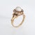 Distinct antique Victorian natural saltwater pearl & diamond ring (circa 1880s to 1900s) crafted in 14 karat yellow gold....