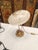 An impressive table lamp, dating to mid-century France. The bulbous, etched glass globe is blown with faint alternating...