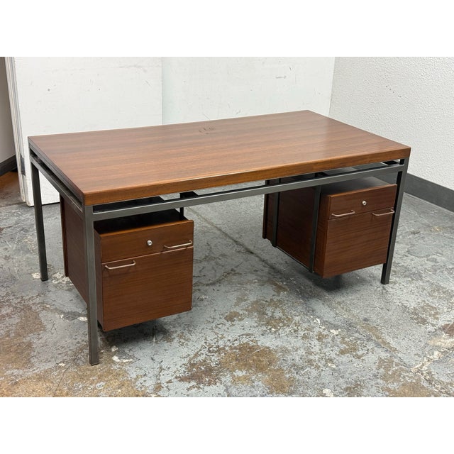 Design Plus Gallery presents a circa 1960’s Executive Desk by Georges Frydman for EFA. This modernist desk pairs a wood...