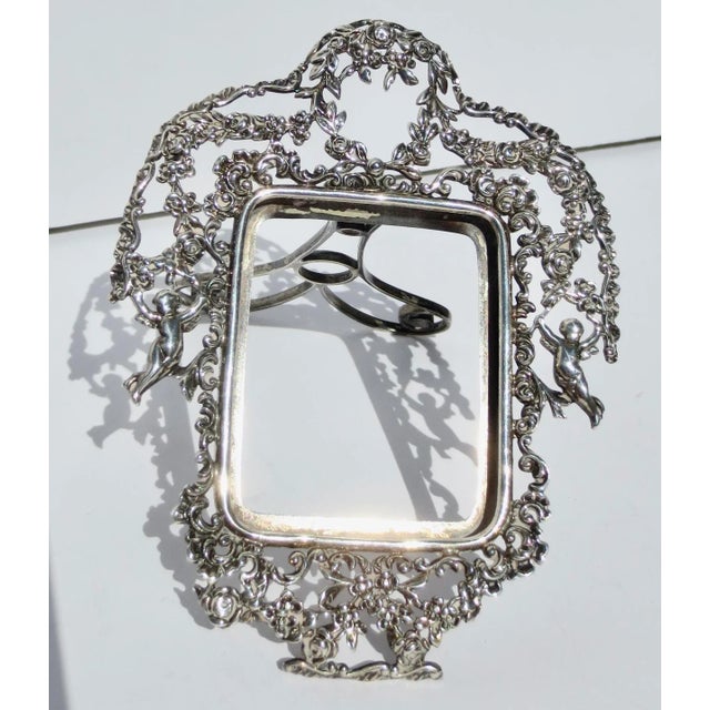 Beautifully ornate 19th-century Sterling silver photo frame by Gorham. Easel back with hallmarks on the back edges. Marked...