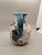 Andrea by Sadek Ceramic Pitcher Covered in Hand Painted Flowers with Blue Handle 7" Tall