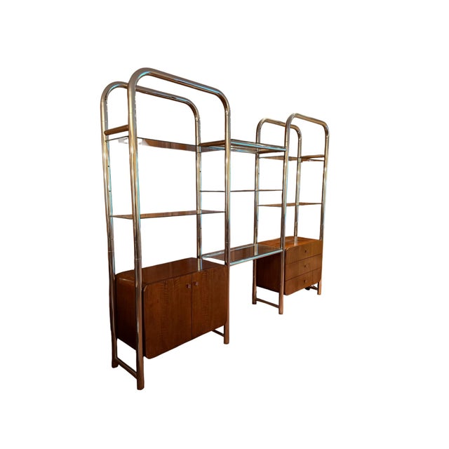 Splendid walnut, tubular chrome and glass Founders shelving unit designed by Jack Cartwright. Circa 1970-80. The highest...