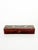 An elegant rectangular lacquered wood box, featuring a delicate hand-painted design on the lid depicting two cranes in...