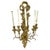 Antique gilt and brass ribbon and musical wall sconce with five arms. Carved gilt ribbon and music themed backplate with...