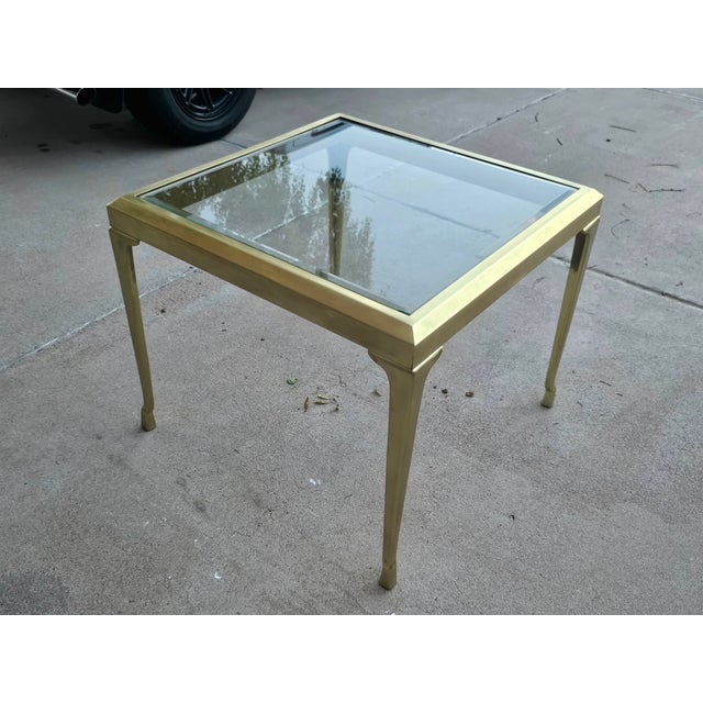 A timeless example of Mastercraft's iconic Hollywood Regency design, this elegant solid brass table features the coveted...