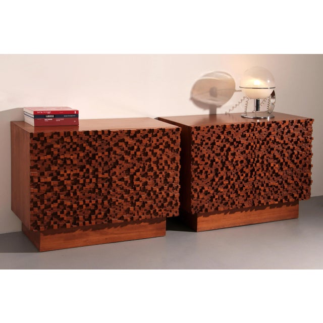 Elevate your living space with this striking pair of contemporary Italian sideboards, where artistry meets functionality....