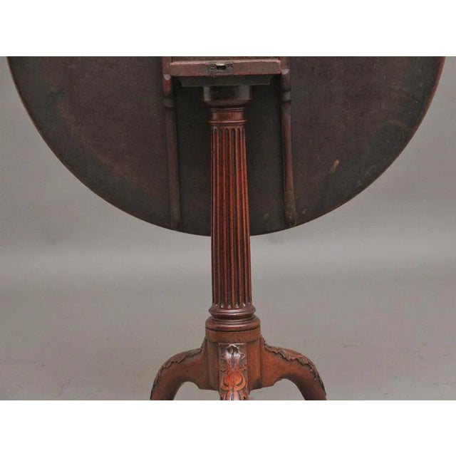 18th Century carved mahogany tripod / wine table, having a lovely figured circular mahogany top supported on a turned and...