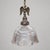 An eagle-topped pendant light with a clear ribbed glass shade and richly aged metal patina. I upcycled this hanging...