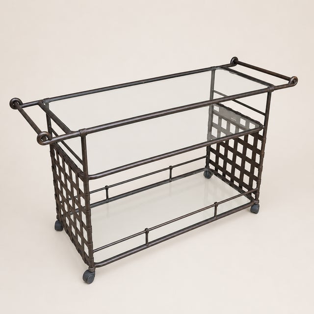 Vintage Brown Jordan attributed Florentine serving cart featuring a speckled deep bronze-tone frame, original glass...