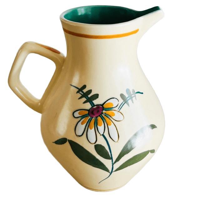 Vintage Mid-century Flora Plateel Gouda jug, Betty decor, made of cream-white ceramic with graphic flowers from the 1960s....