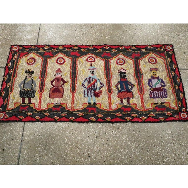 A vintage American Pictorial Hook Rug handmade during the Mid-20 century. Measures: 2' 0" x 4' 4"