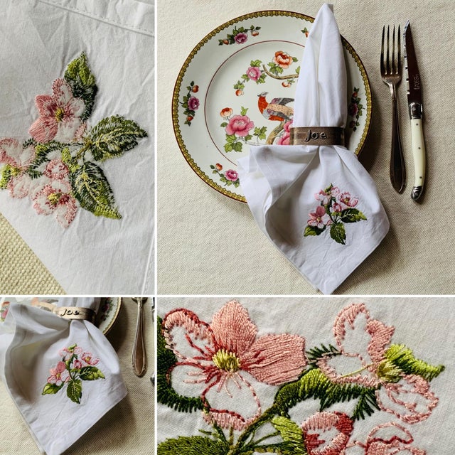 …. A charming set of four large dinner napkins in crisp white cotton percale, each beautifully embroidered with a spray of...