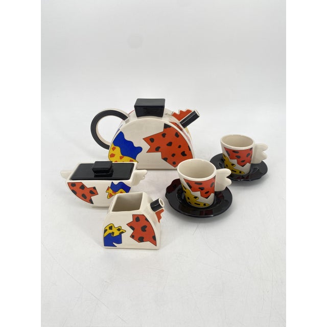 A place setting * Manufacturer: Bottega Laurentia * for Studio Lampo * Arte Ceramica Romana * 80s * Made in Italy * marked...