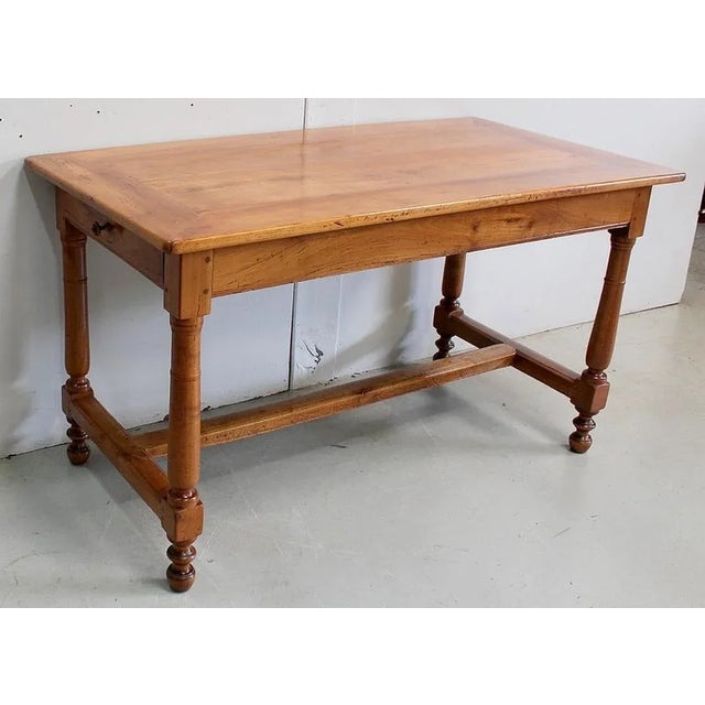 Authentic Cherry wood furniture dating from the end of the 18th century. With a large Mitered Frame Top composed of two...