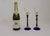 Striking pair of signed art glass martini/cocktail glasses designed by Shafaq Malik. Each glass features a clear flared...