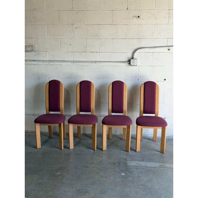 Elegant curved high-back profiles bring a sophisticated and fluid presence to this seating set. The sleek frames boast an...