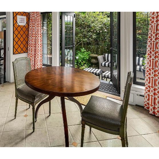 Beautiful matching pair of French-inspired dining chairs. These classic Louis XVI-style chairs feature attractive soft...