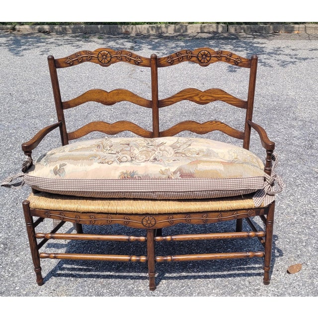 A very beautiful in excellent condition is this country French Rush seat carved two seat bench with a French Market...