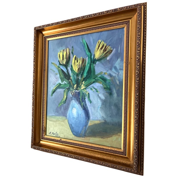 An emotive and painterly still life by Spanish artist Félix Martín Martín, featuring three vibrant yellow blooms arranged...