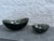 Set of amorphic shape ghray lass bowls with textured exteriors. Design by Per Lutken, for Holmegaard, Denmark. The pattern...