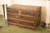 Large Vintage Transport Trunk from Louis Vuitton, 1960s, in Worn conditions. Designed 1960 to 1969 This piece has an...