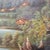 An antique oil on canvas painting, attributed to the Hudson River School, depicts a serene river landscape from circa...