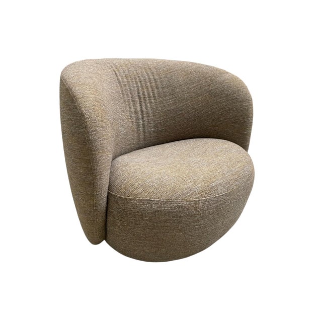 Defined by the pleated, oval-shaped back that gently embraces the rounded seat cushion, the design of the Ovata Chair is...