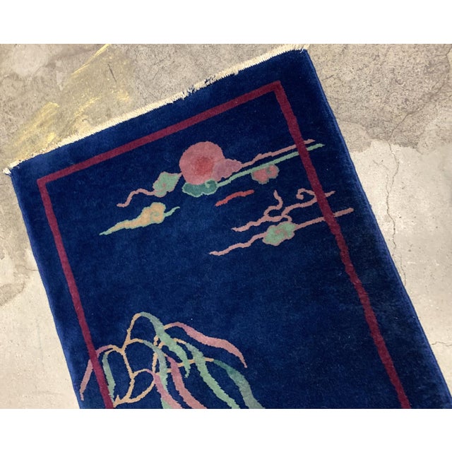 Handmade antique Art Deco Chinese rug in deep blue shade. The rug is from the beginning of 20th century in original...