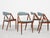 This set of 4 dining chairs is designed by Kai Kristiansen and manufactured by Schou Andersen in Denmark in the 1960s....