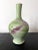 A Japanese long neck porcelain vase circa 1900-1910s by the studio of Miyagawa Kozan (1842–1916), one of the most...