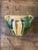 Antique French terracotta jardinière with four loop handles and a striking green, yellow and ochre drip glaze. Made as a...
