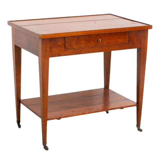 This two-tier mahogany table by David Iatesta exemplifies refined craftsmanship and understated elegance. Constructed from...