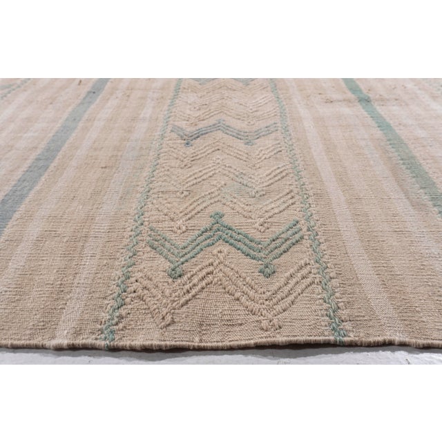This vintage Turkish flat weave Kilim is hand-woven. The simplicity and boldness of this piece can also give a...